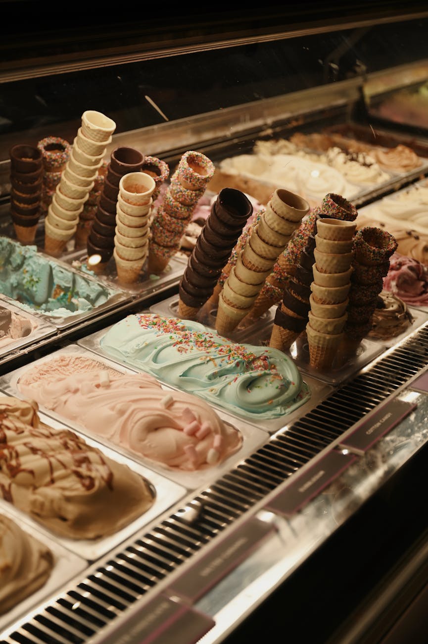 colorful ice cream display with various cones